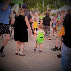 square kid with ifcu back pack
